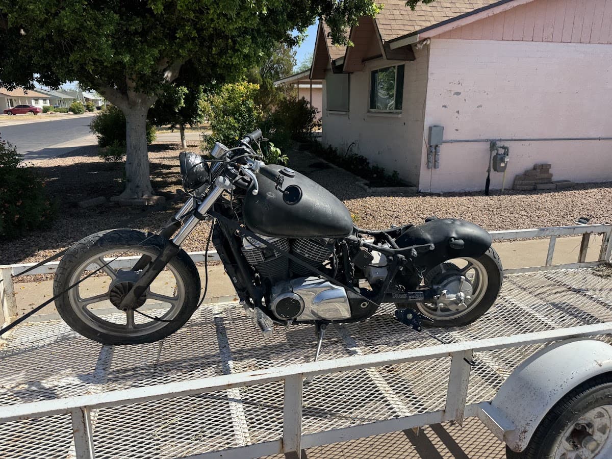 Old motorcycle loaded on the Sonoran Standard trailer for haul-away in the East Valley